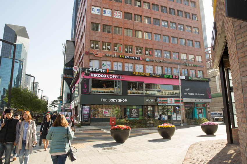 One of the side buildings with a Hikoco Coffee store