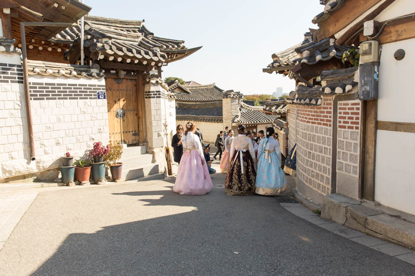 Some girls dressed in traditional Korean dress
