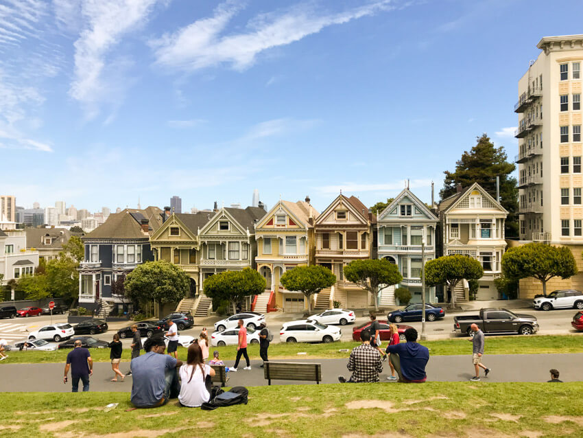 The Painted Ladies, a row of terrace houses – in slightly different colours – on a steep road.