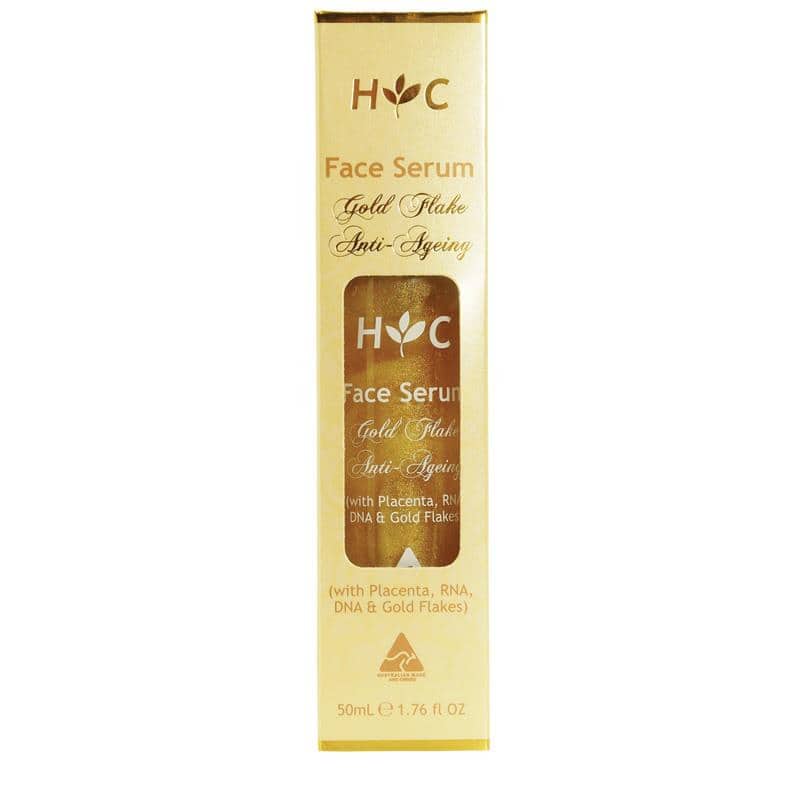 A yellow box with a skincare product inside that is gold in colour. It’s labelled as gold flake anti-ageing serum