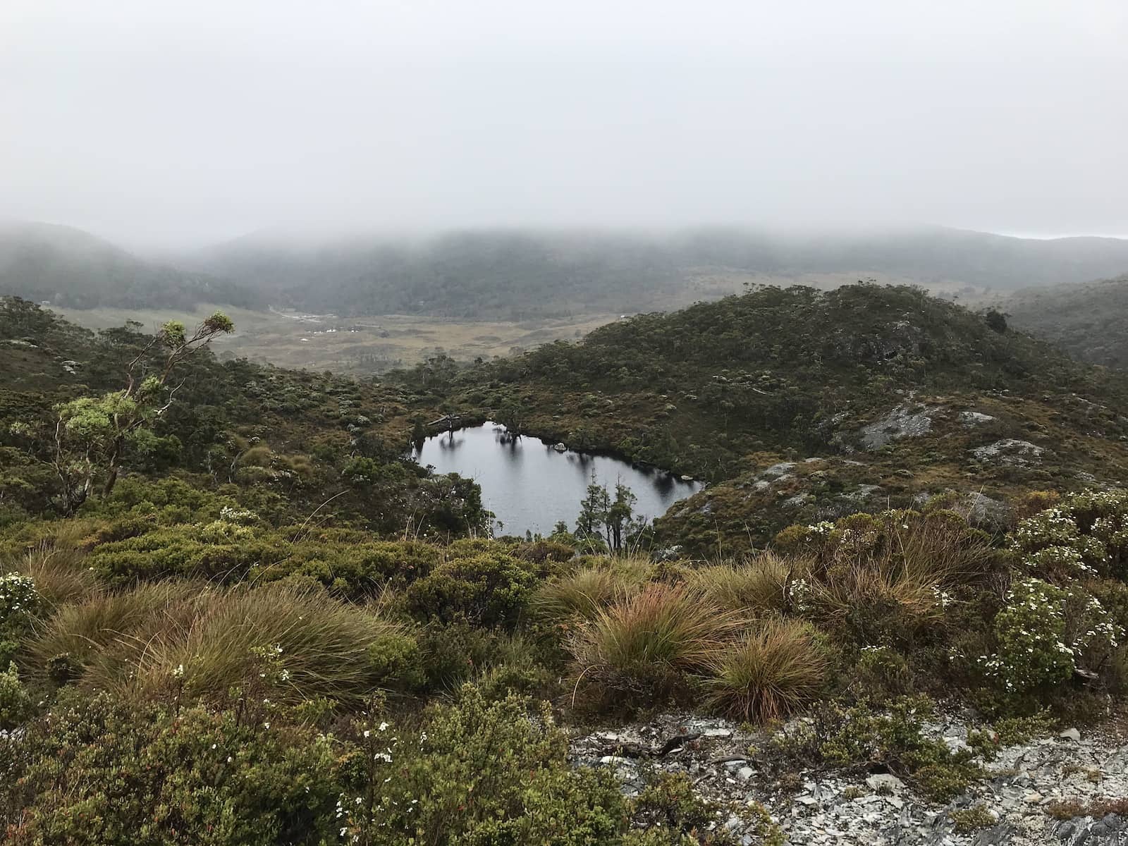 A large natural pool of water seen from afar