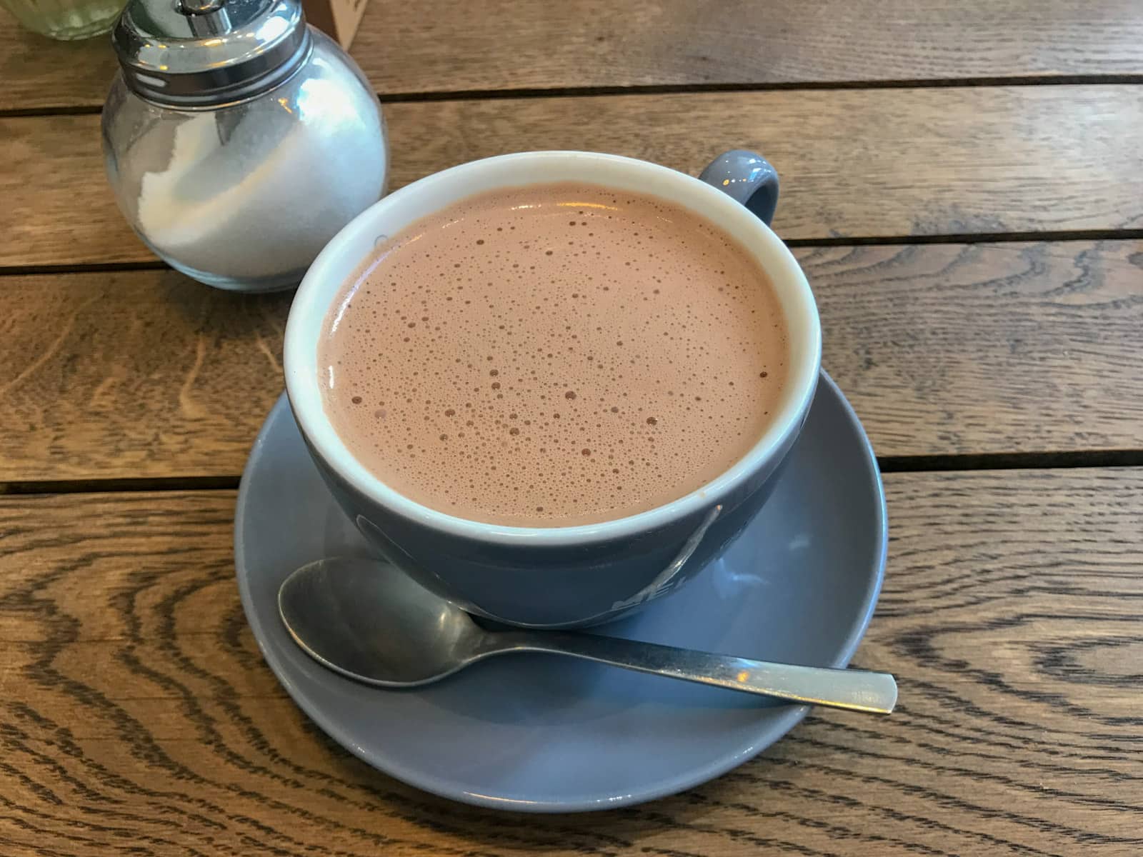 A cup of coffee in a cup on a saucer