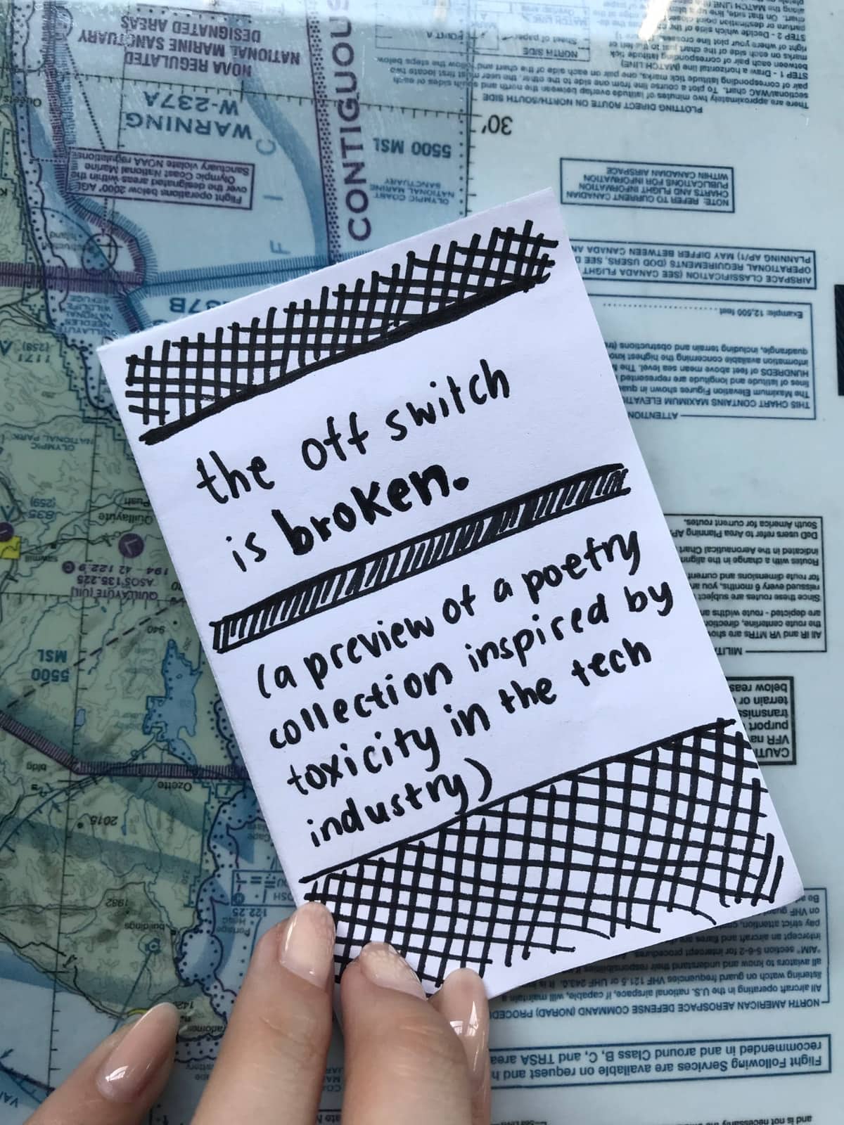 The cover of a small zine with the title “the off switch is broken” (a preview of a poetry collection inspired by toxicity in the tech industry)