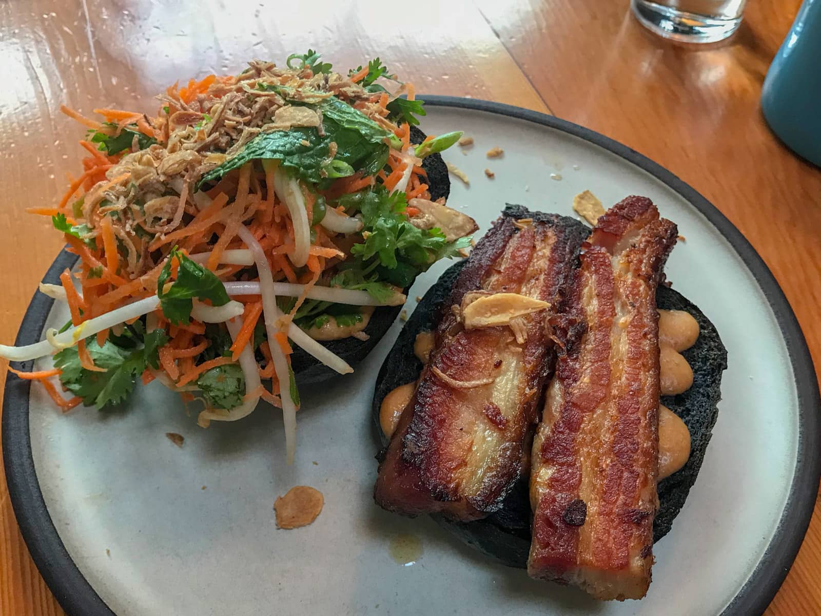 A pork belly bun, served deconstructed