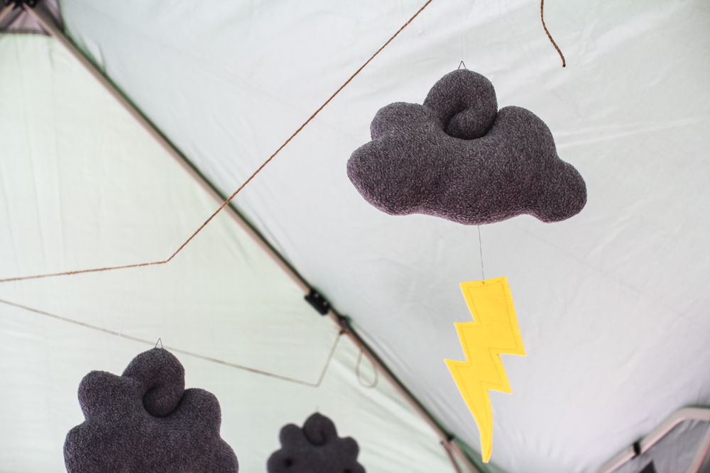 These cute cloud-and-lightning hangings had faces on the opposite side