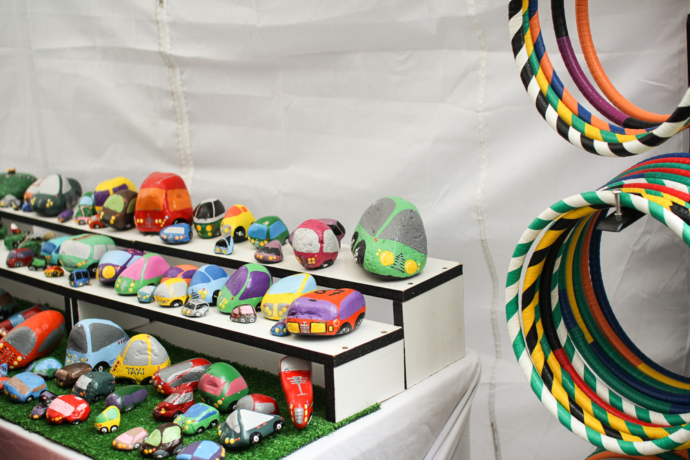 This little stall sold colourful resin accessories and painted rocks