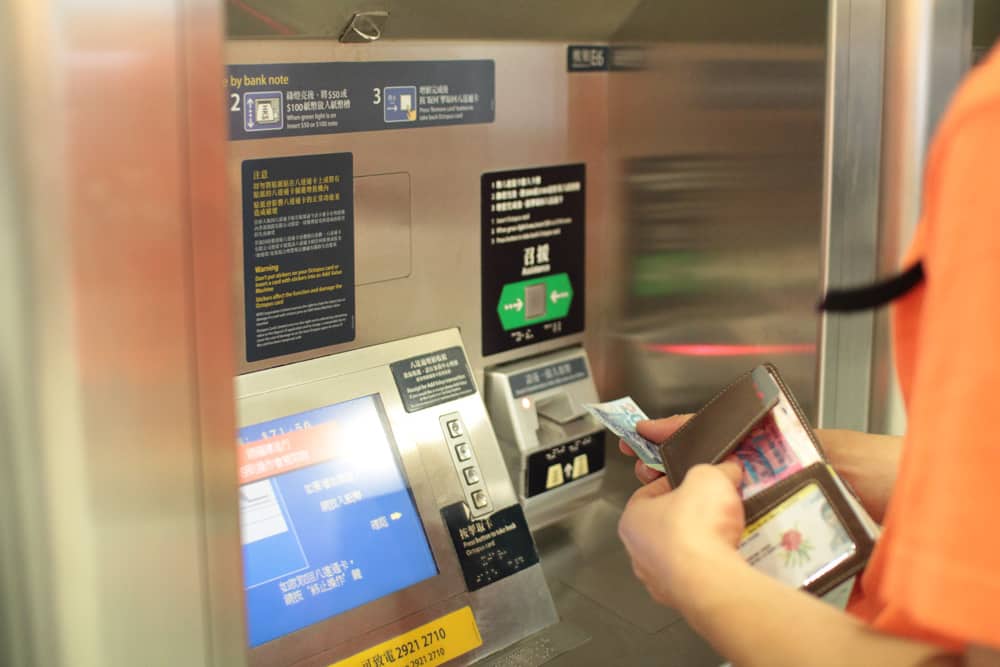 James topping up his Octopus card