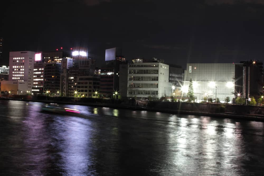 Long exposure shot of a boat going across the water