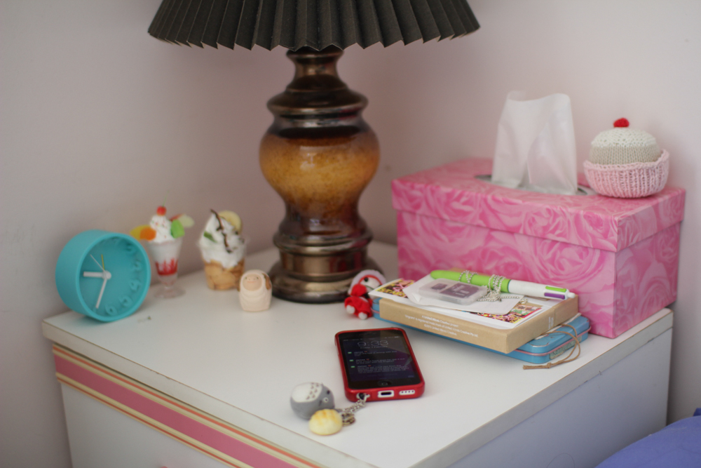 A view of my side desk. Look, you can see the cupcake Manda sent me a while back!