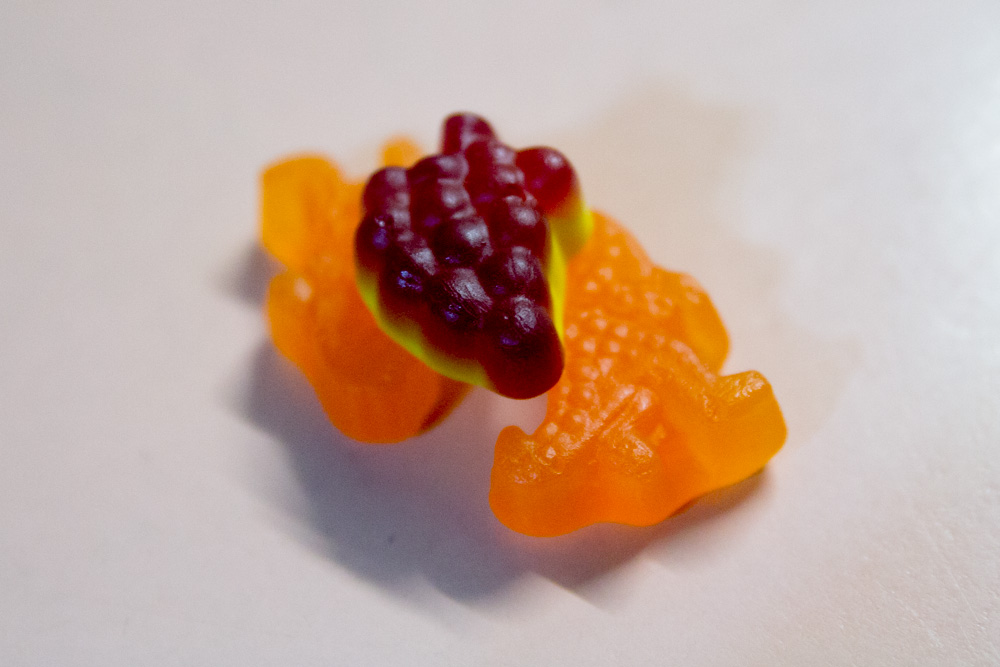 Candy, shaped like grapes and dinosaurs
