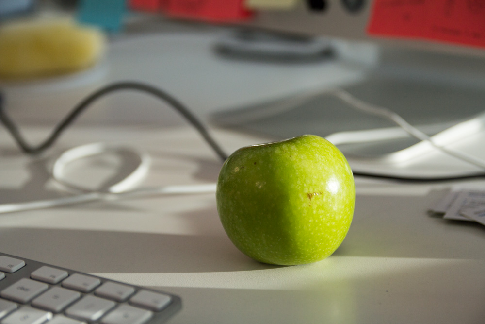 Apple on a desk