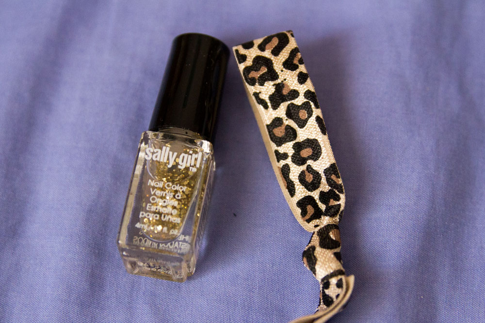 Gold glitter polish and leopard print hair tie