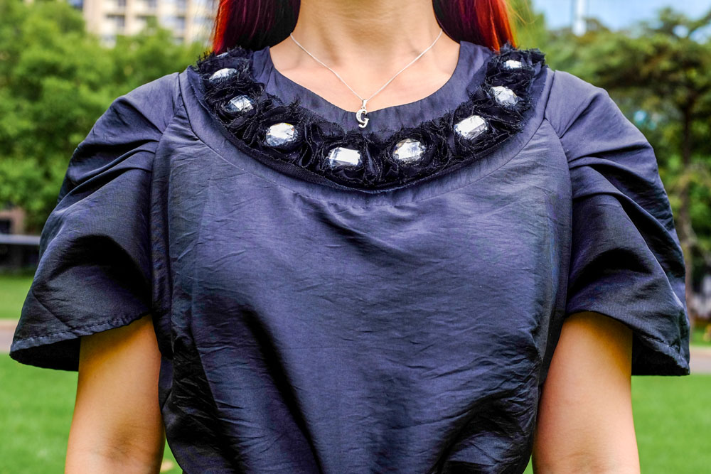 Neckline with faux gemstones