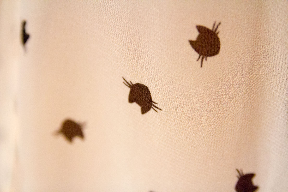 Close-up shot of the cat print on my top