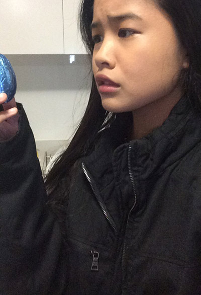 Monica, deeply unimpressed by a cheap Easter egg