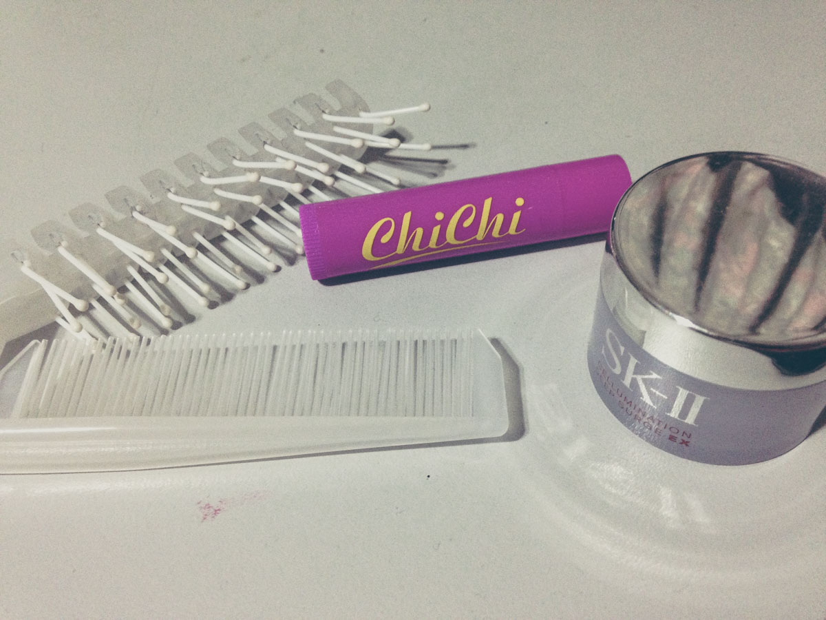Hairbrush, moisturiser and lip balm