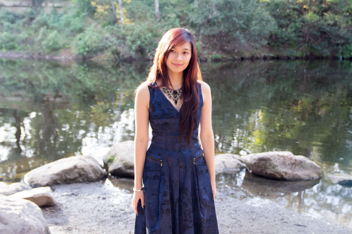 Standing in my blue dress by the lake