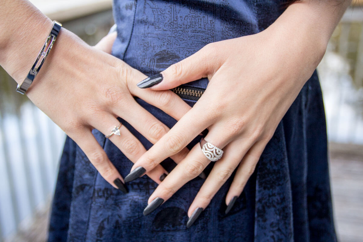 Long black nails, bangle and rings