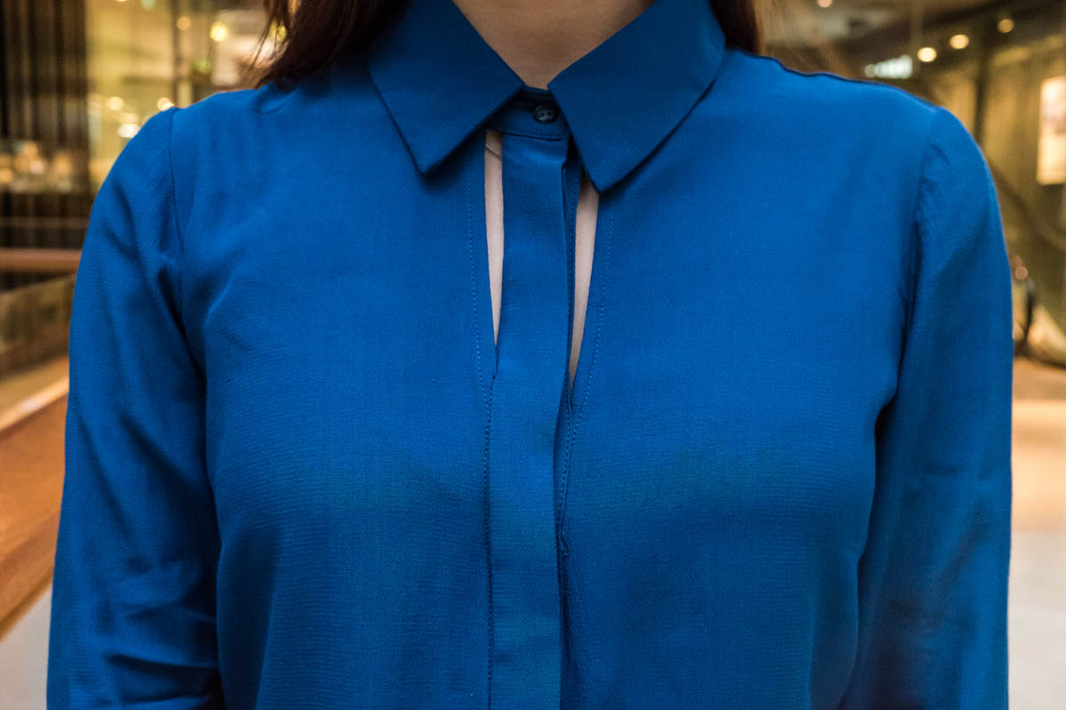 Close shot of the collar and detailing on the front of the shirt