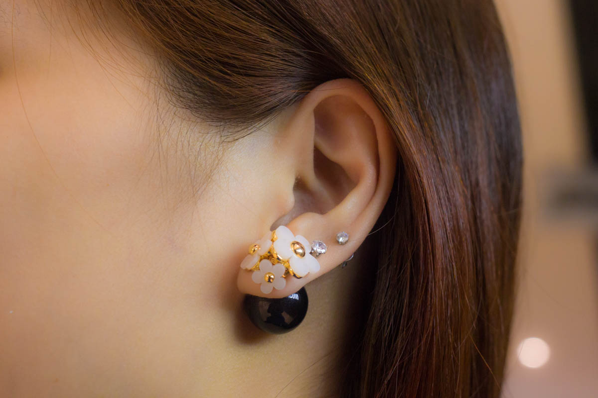 Close up shot of daisy earrings