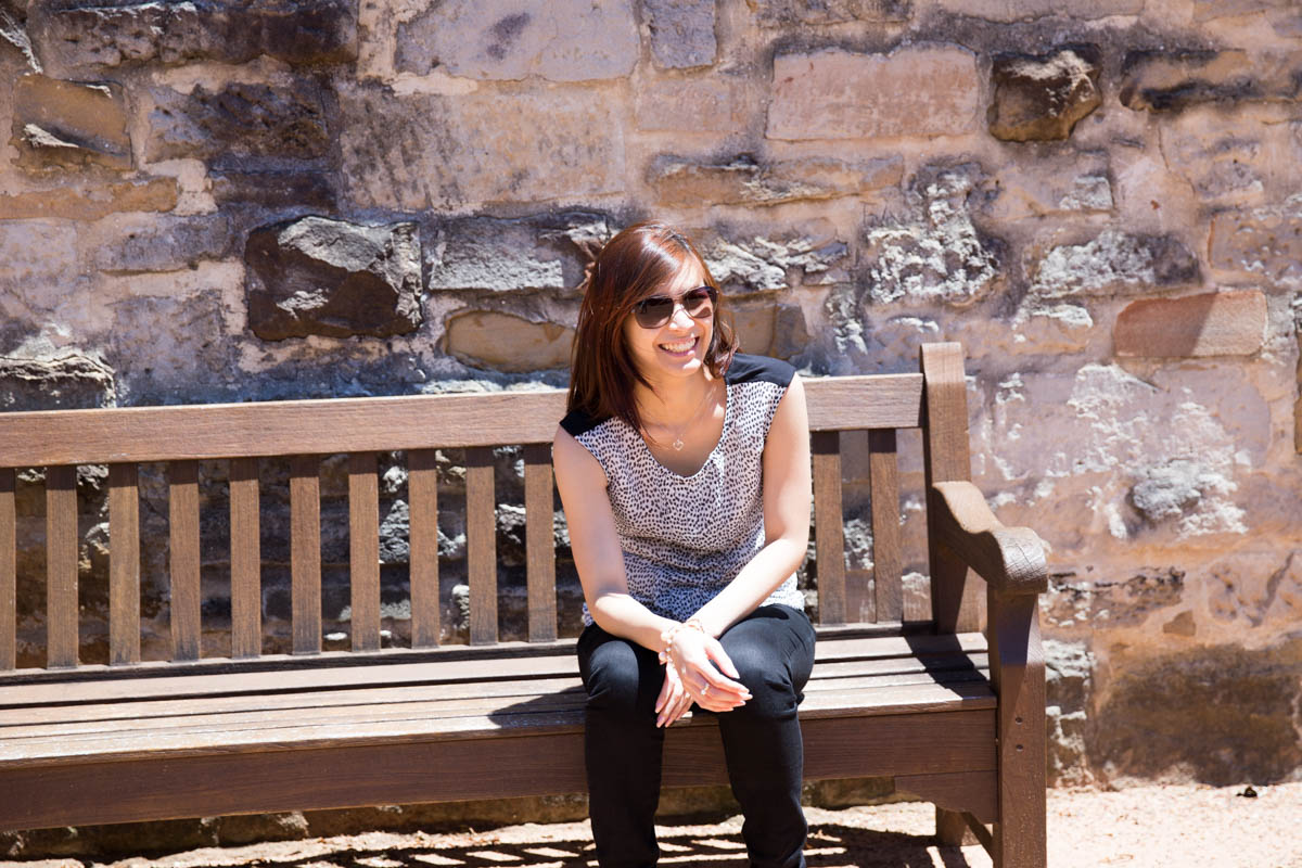 Sitting on a wooden bench