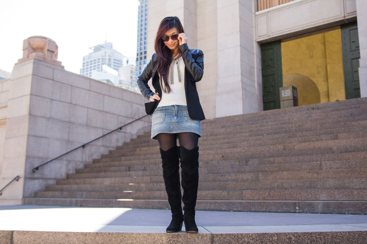 Full body shot on top of a flight of stairs