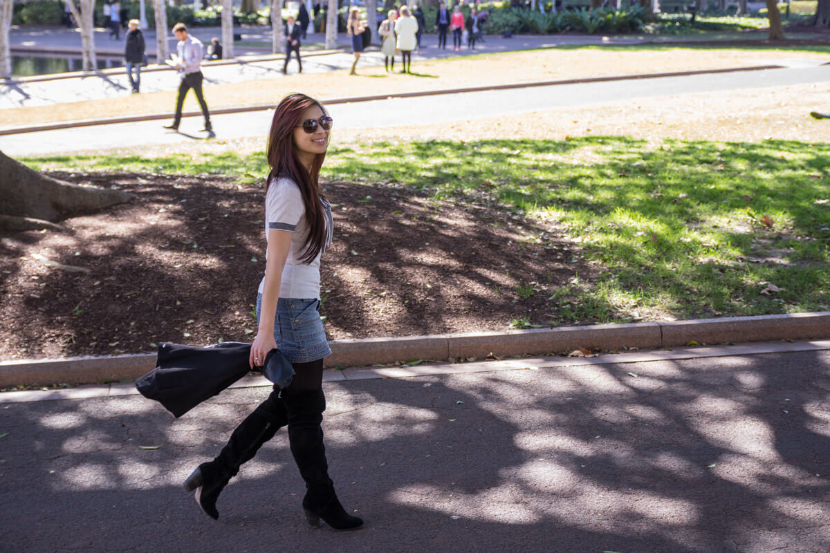 Walking and smiling with my jacket in hand