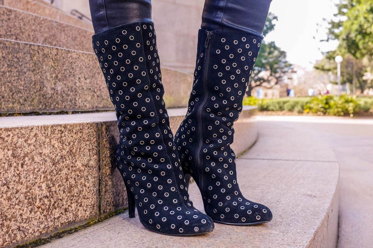 Heeled boots with silver round ring studs