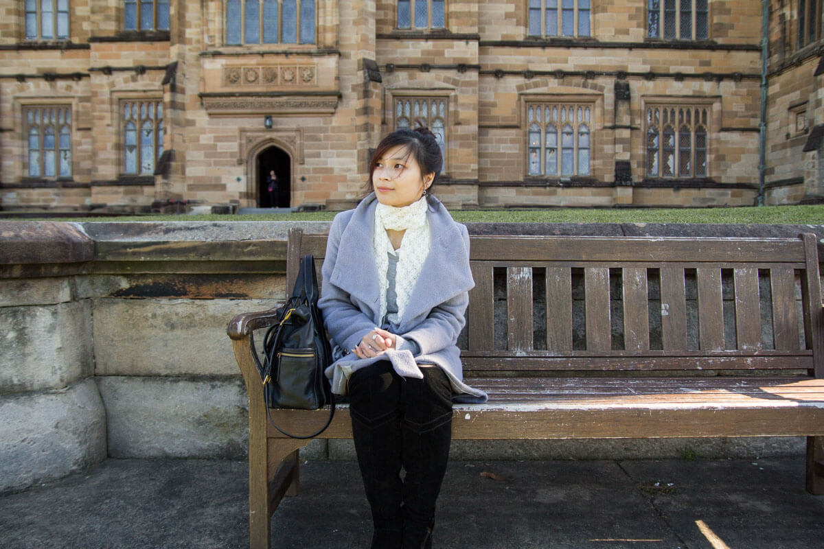 Sitting on a wooden bench