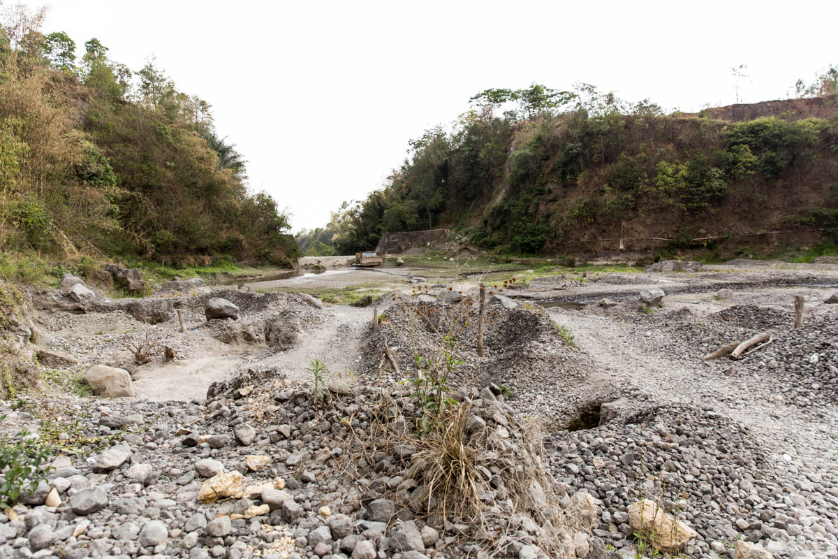 The rocky result of a volcano erupting on a mountainous area