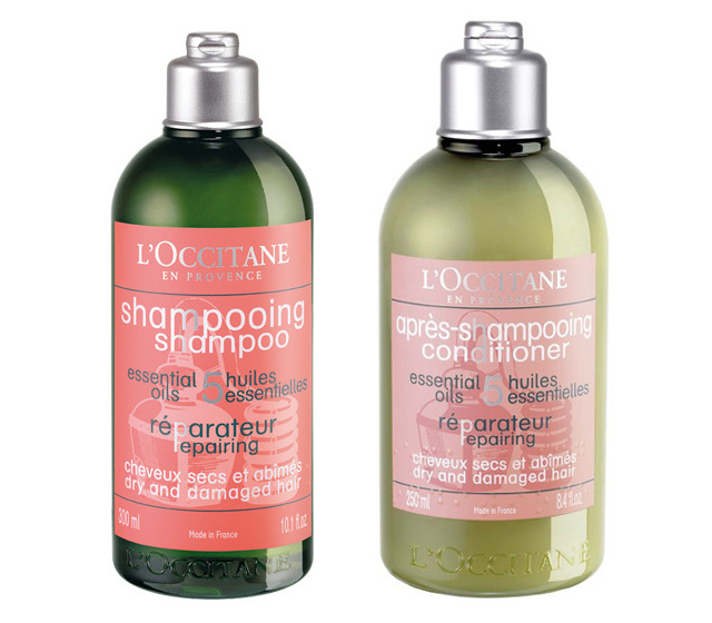 L’OCCITANE repairing shampoo and conditioner bottles.